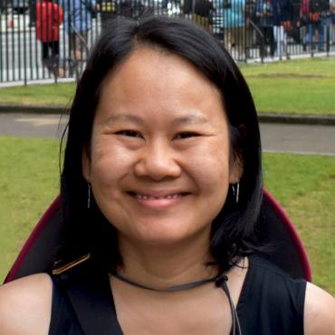 Susanna Horng, a Taiwanese-American writer, is smiling at the camera.