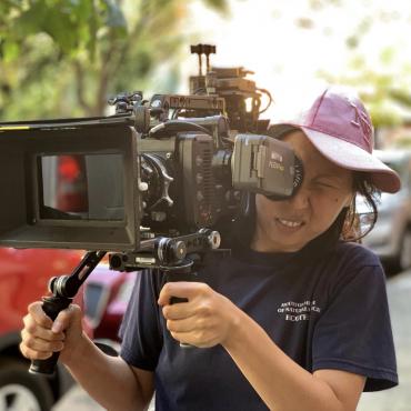 Jingjing Tian, a Chinese American filmmaker based in NYC, behind the camera.