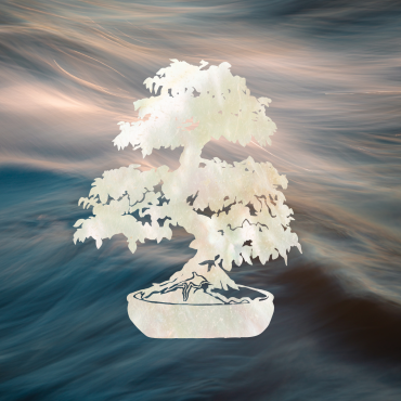 Bonsai carved out of mother of pearl inlay on a wave background