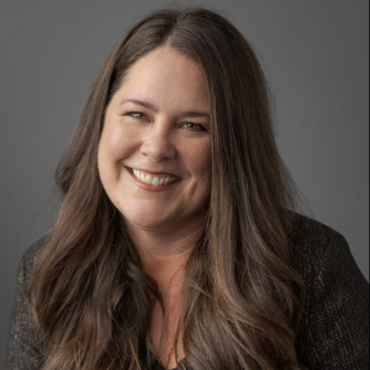 Kyle smiling at the camera