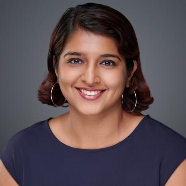 Schweta smiling at the camera