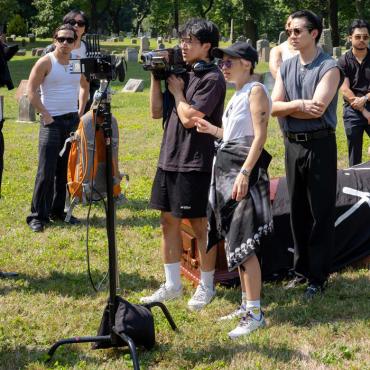 Sally Tran on the set of the documentary Born To Kill with D.P, directing 30 Asian actors in Brooklyn, NYC. 