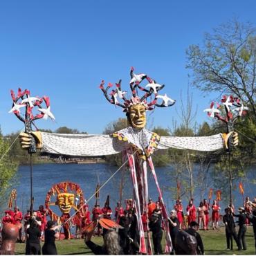 Picture of the large Tree of Life puppet with its arms outstreched